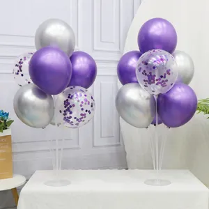 Birthday party balloon table stand decoration set with purple and silver latex balloons.