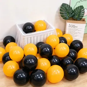 Thick black and yellow latex balloons set for birthday party, Halloween, and event decoration.