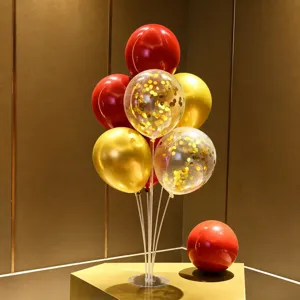 Balloon table centerpiece kit with red, gold and confetti balloons for birthday party decor.