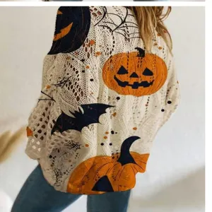 Halloween hollow knit sweater featuring pumpkin and bat print, long sleeve casual top.