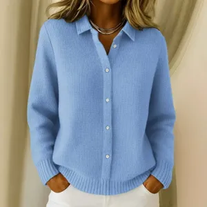 Light blue waffle knit long sleeve button down cardigan detail shot showcasing textured fabric.