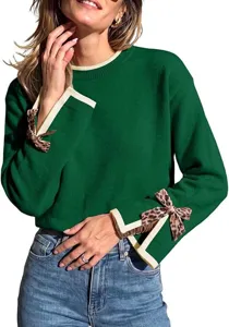 Green knit sweater with contrast ribbed cuffs and stylish leopard print bows detail.