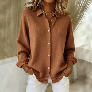 Detailed view of women's long sleeve knitted button-down cardigan shirt in casual autumn brown.