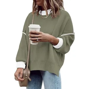 Casual loose knit sweater for women featuring crewneck, lantern sleeves, and contrast white trim.