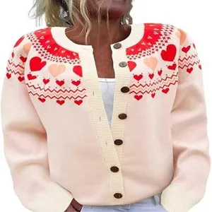 Detailed view of women's knit cardigan with cute heart jacquard and front button design.