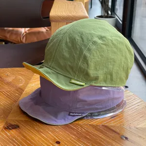 Detailed view of kids quick-drying foldable soft-brim reversible outdoor baseball cap.