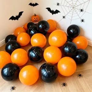 Halloween black and orange balloon set details showing festive party decoration props.
