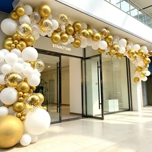 Gold and white balloon arch kit for store grand opening, party, and celebration decor.