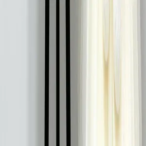 Minimalist detail view showing three vertical black stripes and soft flowing texture.