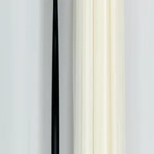 Minimalist pleated decoration detail shot, elegant vertical lines texture prop design.