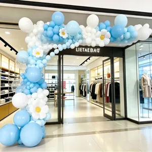 Detailed view of blue and white balloon arch decoration set for retail store opening party setup.
