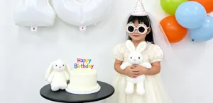 Kids birthday party decoration supplies set with cute plush rabbit toys, cake and colorful balloons