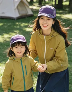 Detailed outdoor view of kids and adults wearing retro quick-drying five-panel caps.