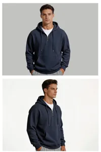 Detail view of men's waffle knit quarter zip hoodie in navy blue, comfortable long sleeve casual top.