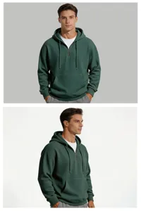 Close-up detail of men's dark green waffle knit quarter zip hoodie showing texture and hood.