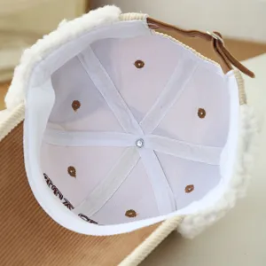 Kids corduroy baseball cap inner detail view, warm winter earflap hat with clean lining design.