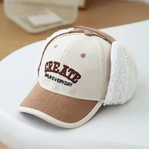Kids corduroy baseball cap with warm earflaps and embroidery letters for autumn winter.