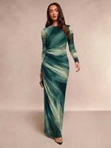 Elegant long sleeve maxi dress featuring an artistic abstract marble print and chic ruched design.