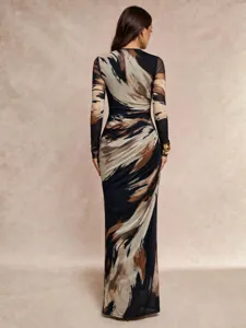 Back view detail of the elegant women's abstract marble print long sleeve maxi dress.