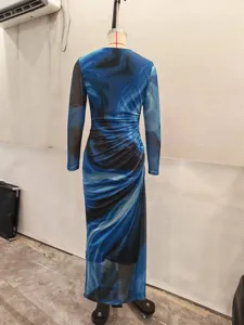 Women elegant marble print long sleeve mesh dress back view detail showing slim fit silhouette.