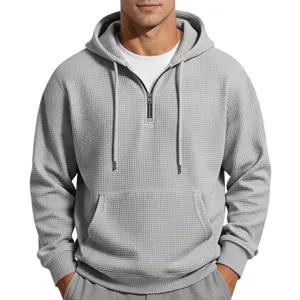 Men's grey waffle knit quarter zip hoodie casual long sleeve hooded sweatshirt with pocket.