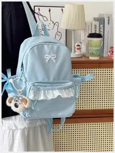 Zaino estetico blu chiaro con tasca con volant carina per la scuola e uso quotidiano.