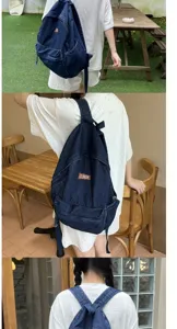 Zaino in denim lavato vintage coreano di grande capacità per studenti e tempo libero.