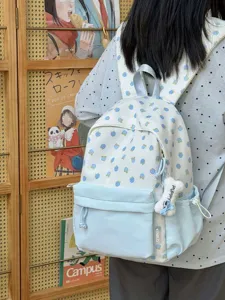 Zaino da studente floreale carino dettaglio vista, dolce borsa scolastica con tasca.