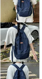 Zaino in denim lavato vintage per donna e uomo, grande borsa scolastica casual spaziosa.