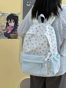 Zaino casual in stile coreano con fresco design a pois, grande capacità per uso quotidiano.