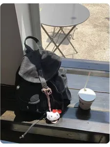 Mochila casual de mezclilla negra, bolso escolar versátil para estudiantes, mochila de viaje ligera.