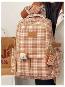 Detail view of retro plaid student backpack, large capacity campus style book bag.