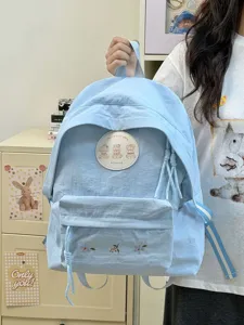 Mochila de estudiante minimalista coreana, bolso casual azul claro con bonito parche de osito.