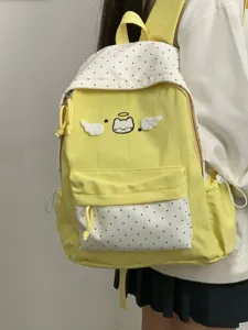 Cute yellow polka dot canvas backpack with cat wing embroidery for students and teen girls.