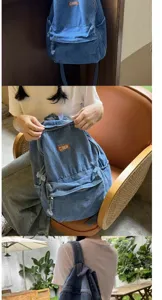 Dettagli dello zaino in denim lavato vintage che mostra la texture e l'etichetta frontale.