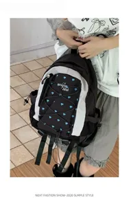 Korean style heart print backpack casual colorblock school bag for teens and women.