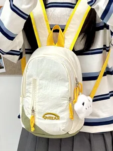 Mochila informal mini para mujer, mochila de viaje ligera para exteriores con bolsillo y colgante.