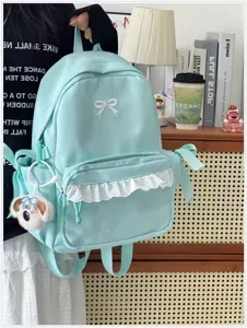 Zaino stile coreano verde menta con fiocco carino, volant in pizzo e grande capacità per studenti.