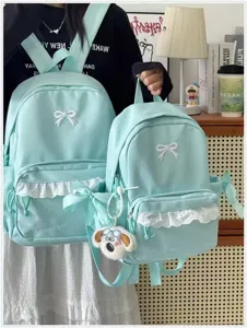 Zaino scolastico verde menta carino con fiocco e pizzo per ragazze stile casual quotidiano