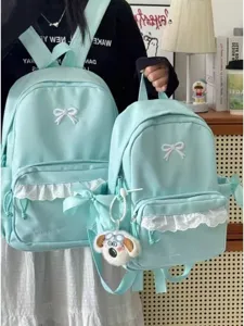 Zaino verde menta stile coreano con fiocco bianco e ciondolo cane grazioso per ragazze.