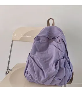 Casual paarse gewassen canvas rugzak, minimalistische schooltas voor dames en dagelijks.