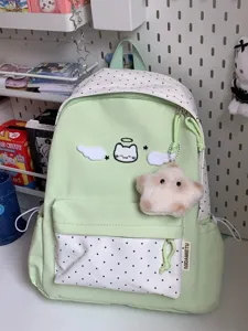 Cute aesthetic winged cat backpack large capacity green polka dot school bag for student