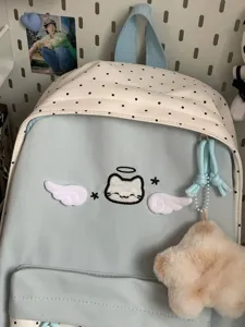 Korean cute angel cat embroidered backpack, large capacity sweet school bag for students.