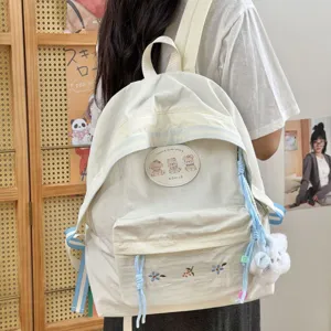 Mochila escolar blanca casual con lindo parche de oso, gran capacidad y diseño elegante.