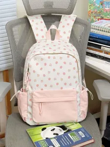 Vista dettagliata del simpatico zaino studentesco rosa e bianco con motivo di orsi e frutta.