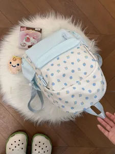 Zaino floreale blu carino da donna, zainetto da viaggio in stile dolce con tasca frontale.