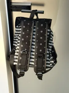 Zaino casual a righe con stampa di stelle, elegante borsa scolastica per viaggio quotidiano.