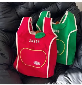 Linda mochila de lona con diseño de manzana para mujer, gran capacidad para la escuela y viajes.
