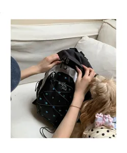 Korean style contrast color backpack with cute blue heart print, casual school bag for daily use.