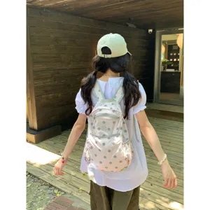 Korean ins polka dot backpack, cute lightweight student schoolbag for casual daily wear style.
